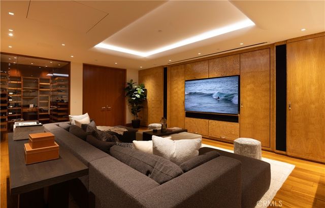 a view of a dining room with furniture and a potted plant