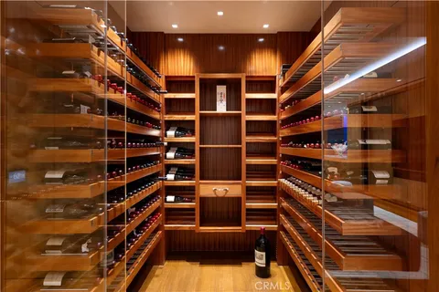 a view of an empty room with a ceiling fan