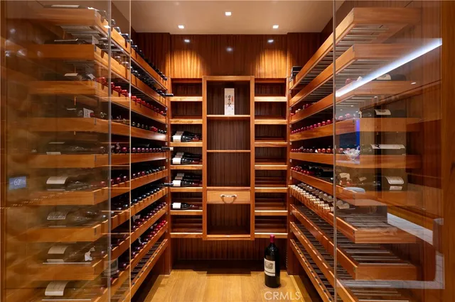 a view of an empty room with a ceiling fan