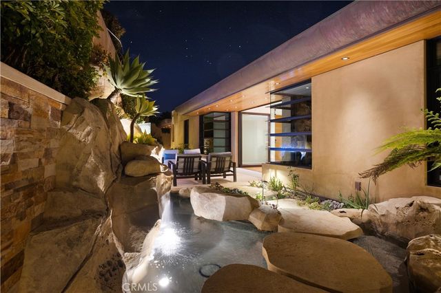 a outdoor space with lots of tables and chairs