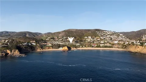 an aerial view of residential house and green space