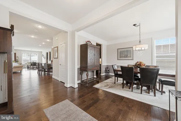 a view of a livingroom with workspace and a couch
