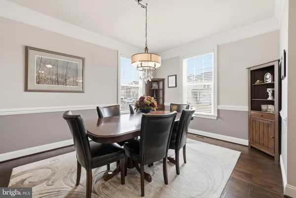 a kitchen with granite countertop a sink and cabinets