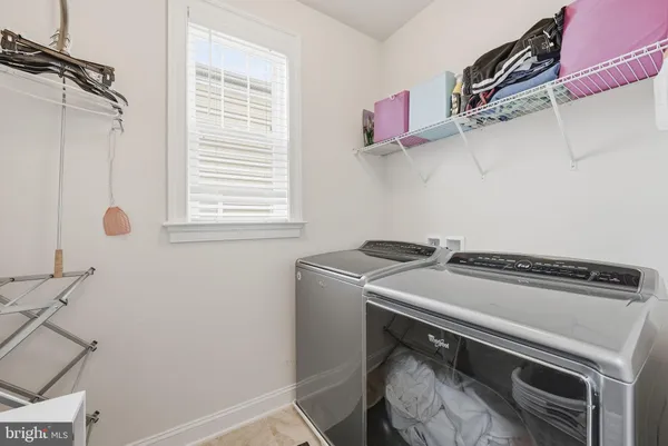 a room with furniture and a couch