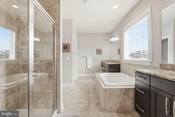 a view of a swimming pool with outdoor seating