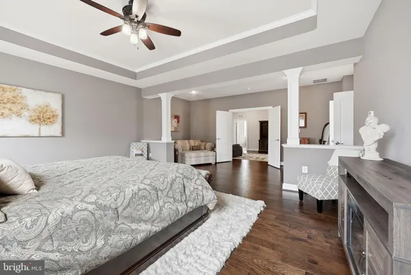 a view of a lake with houses in the background