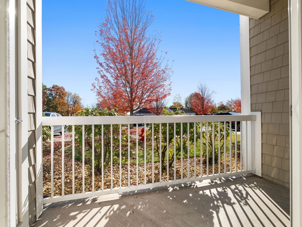 170 Clocktower Drive, Unit 5103 Waltham, MA 02452 - Photo 20 of 29 a street view from a balcony