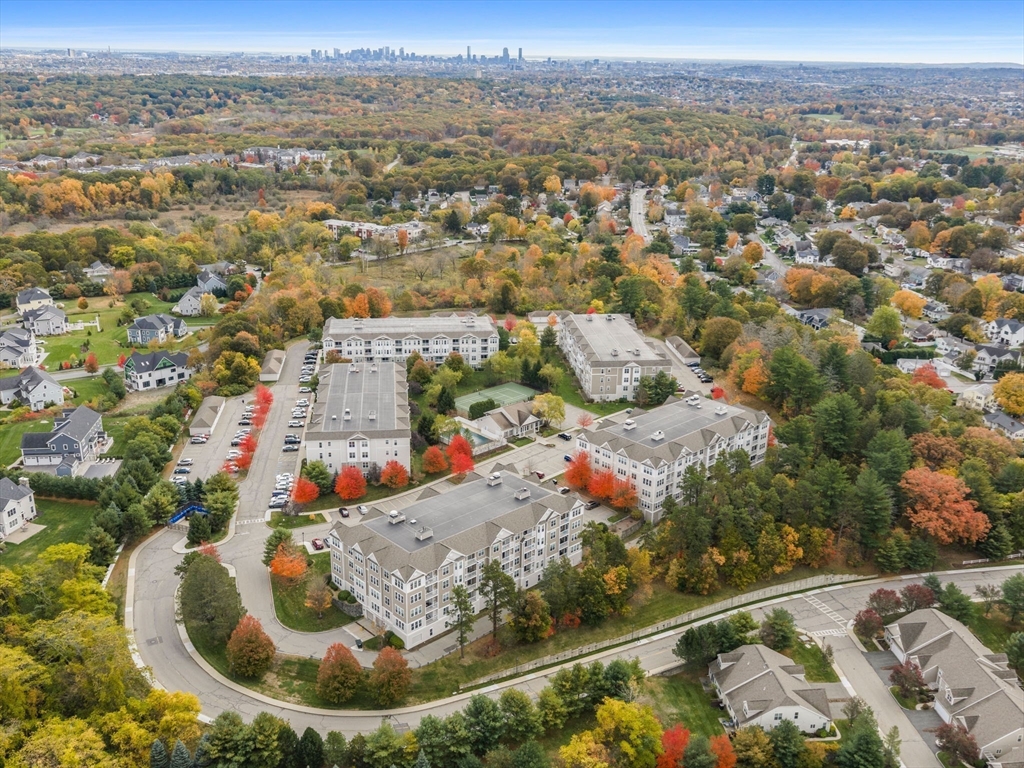 170 Clocktower Drive, Unit 5103 Waltham, MA 02452 - Photo 26 of 29 an aerial view of residential houses with outdoor space