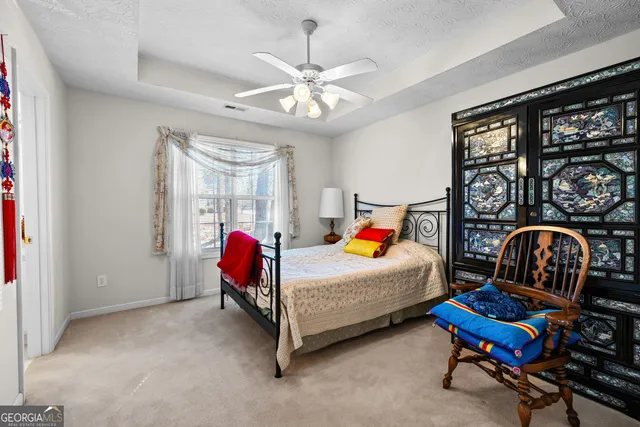 a view of backyard with green space