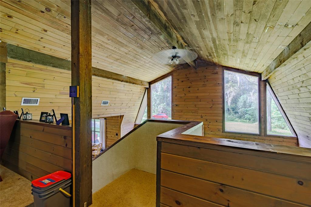 1600 Southwest 42nd Street Ocala, FL 34471 - Photo 11 of 57 a view of a door and chair in the balcony