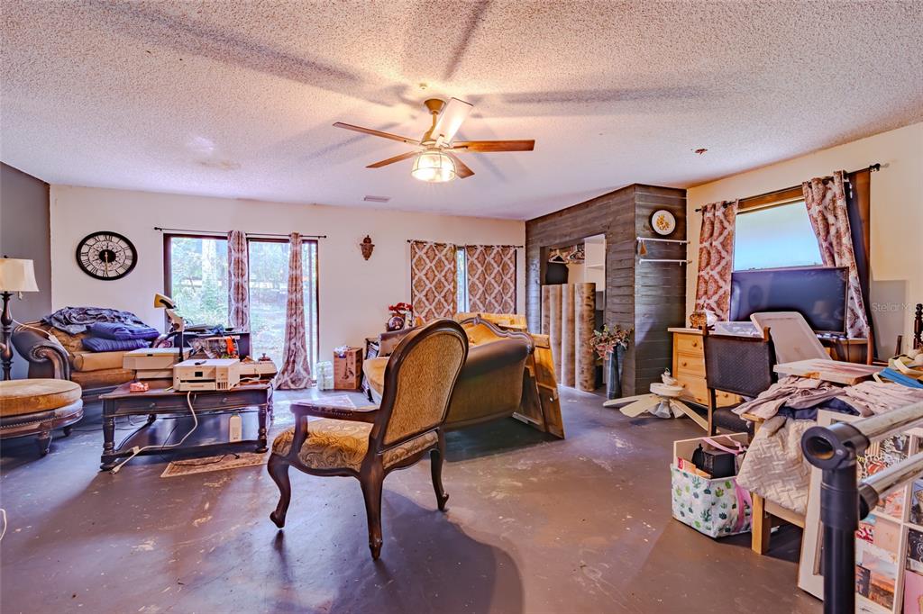 1600 Southwest 42nd Street Ocala, FL 34471 - Photo 39 of 57 a bedroom with furniture and a window