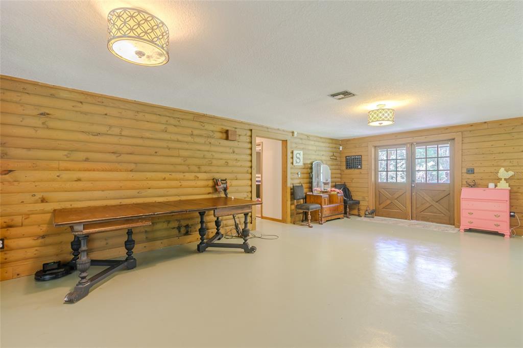 1600 Southwest 42nd Street Ocala, FL 34471 - Photo 44 of 57 a view of a livingroom with furniture and a ceiling fan