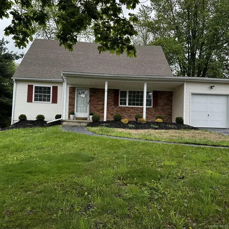 a front view of house with yard