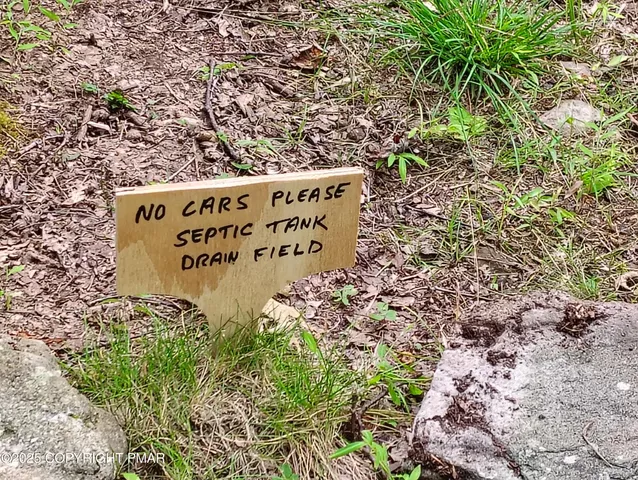 a sign on the side of the road