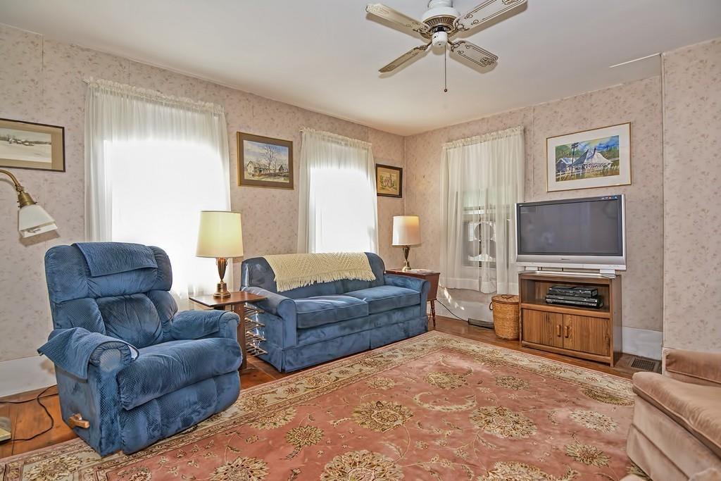 5 Rice Corner Road Brookfield, MA 01506 - Photo 19 of 42 a living room with furniture and a flat screen tv