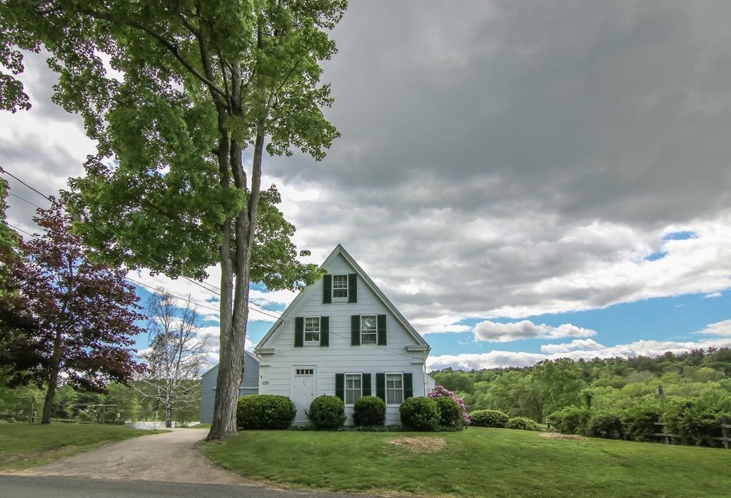 5 Rice Corner Road Brookfield, MA 01506 - Photo 3 of 42 a front view of a house with a yard