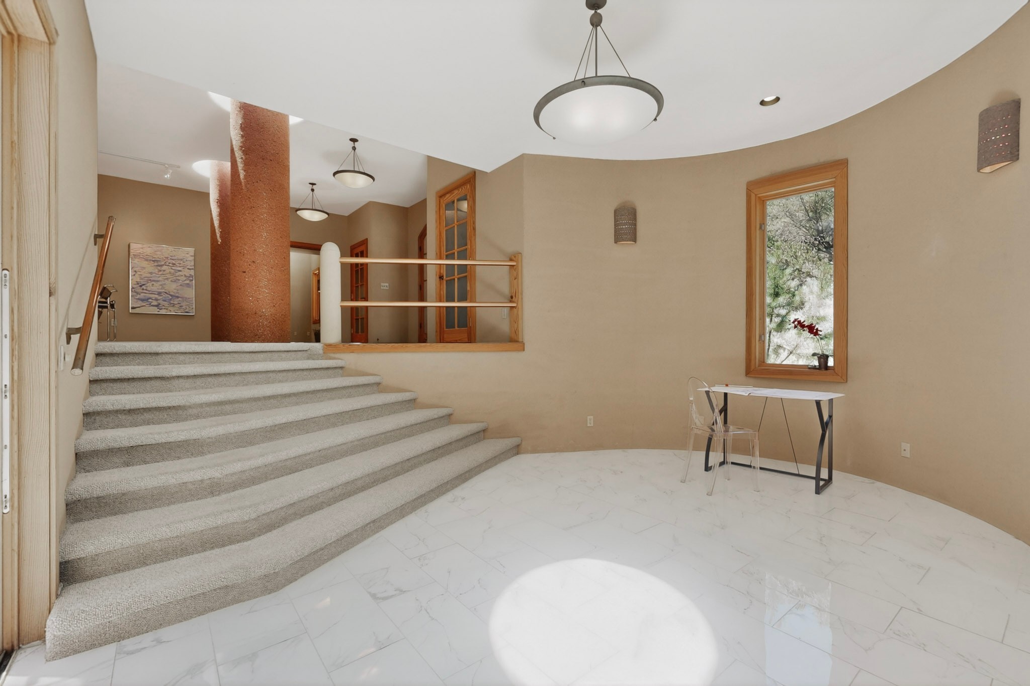 1404 Tesuque Creek Road Santa Fe, NM 87501 - Photo 24 of 55 Steps from the living room down to the kitchen