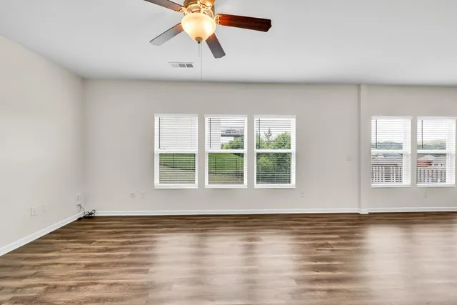 an empty room with windows