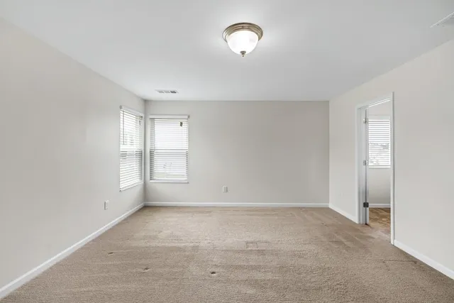 a view of an empty walk in closet