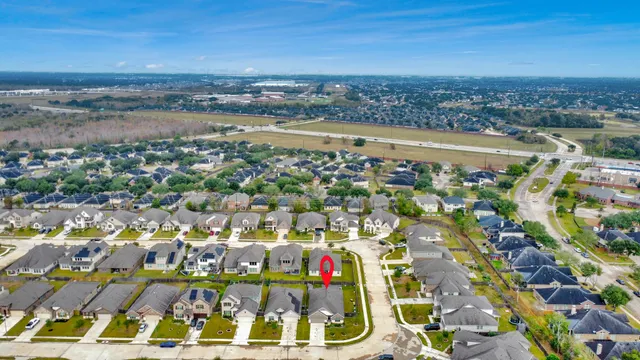 an aerial view of residential building and lake view