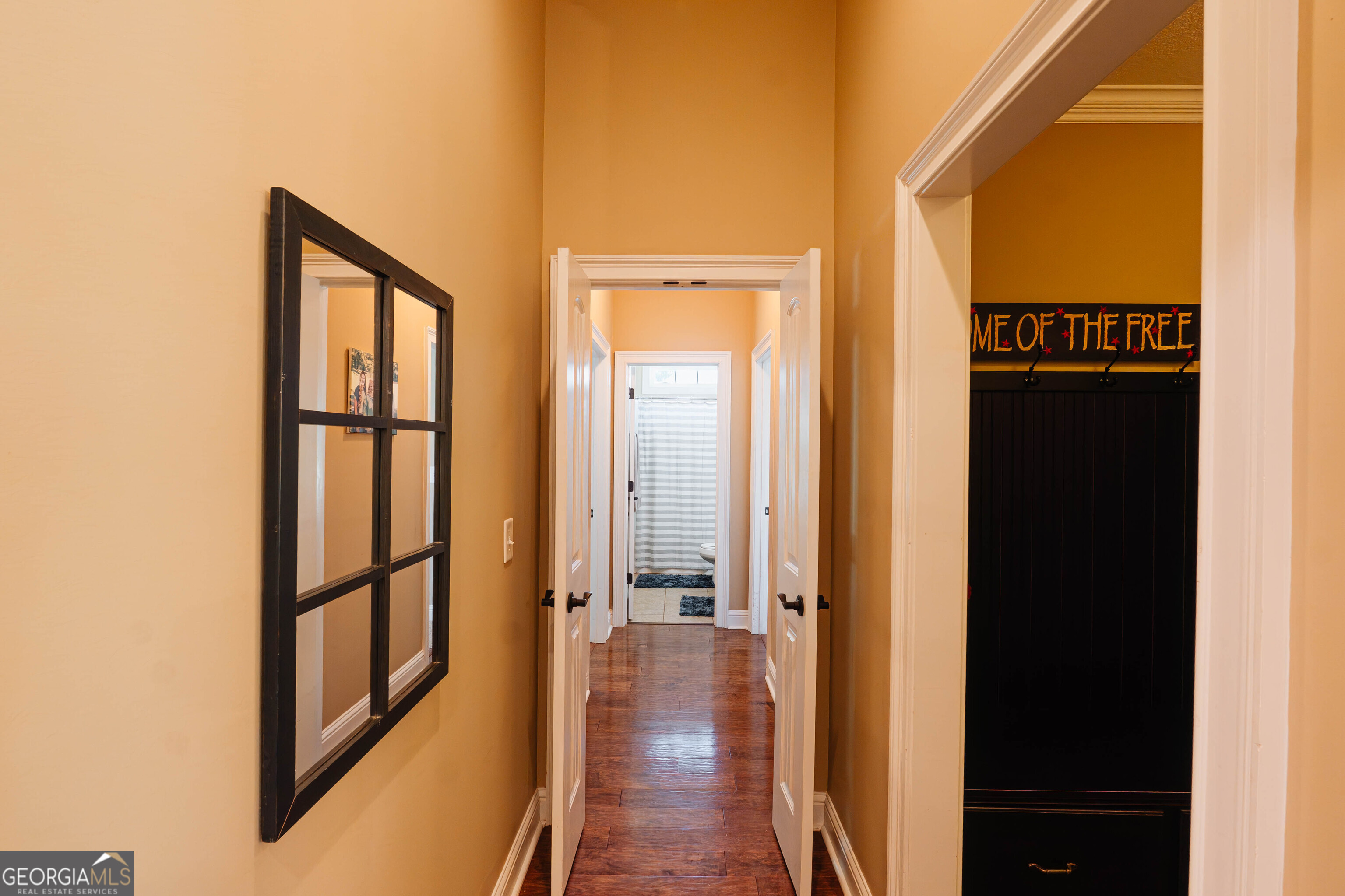 501 Old Bridge Road Warner Robins, GA 31088 - Photo 20 of 54 a view of a hallway with wooden floor and staircase