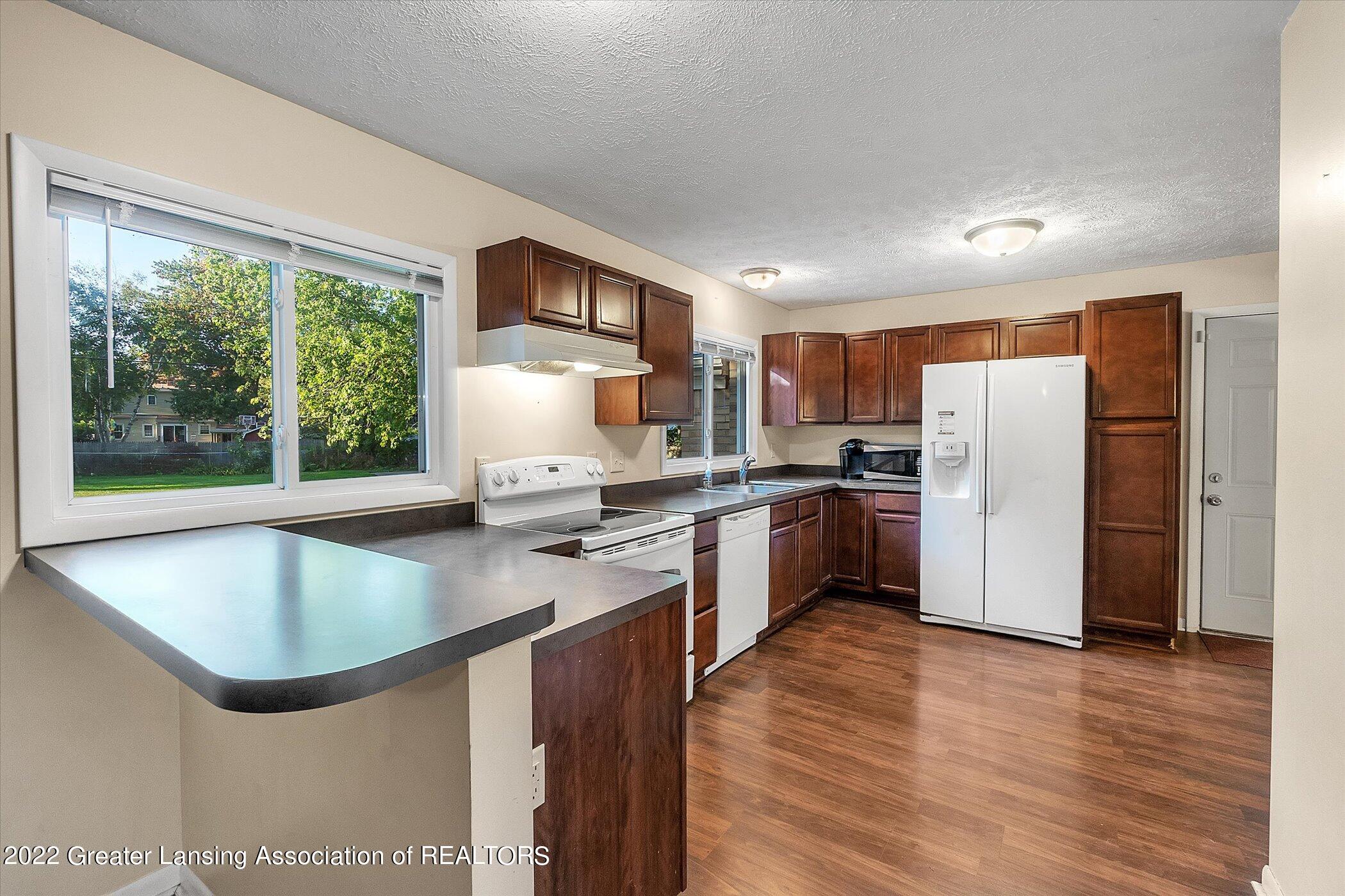 2731 Arlington Road Lansing, MI 48906 - Photo 10 of 30 10-2731-Arlington-Rd-WindowStill-Real-Es