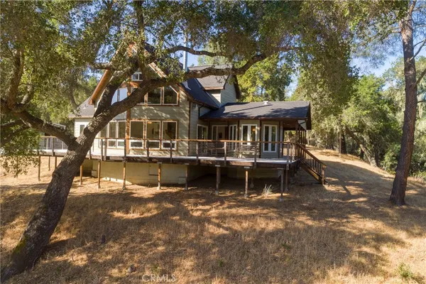 a front view of a house with a boat