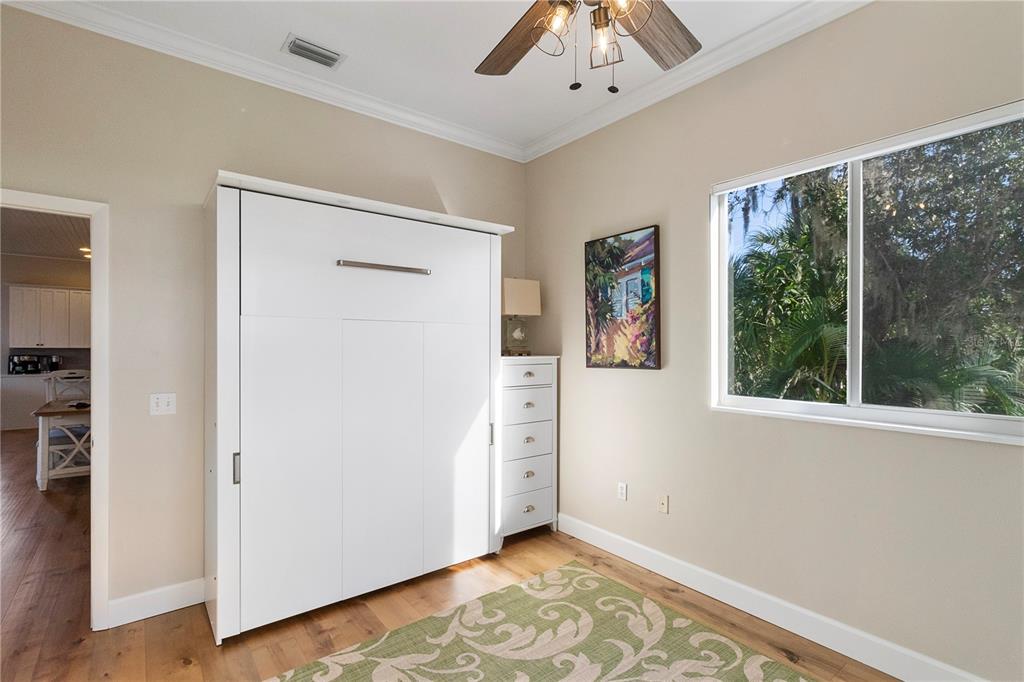 7325 Holly Road Terra Ceia, FL 34250 - Photo 23 of 87 a view of livingroom with furniture wooden floor and window