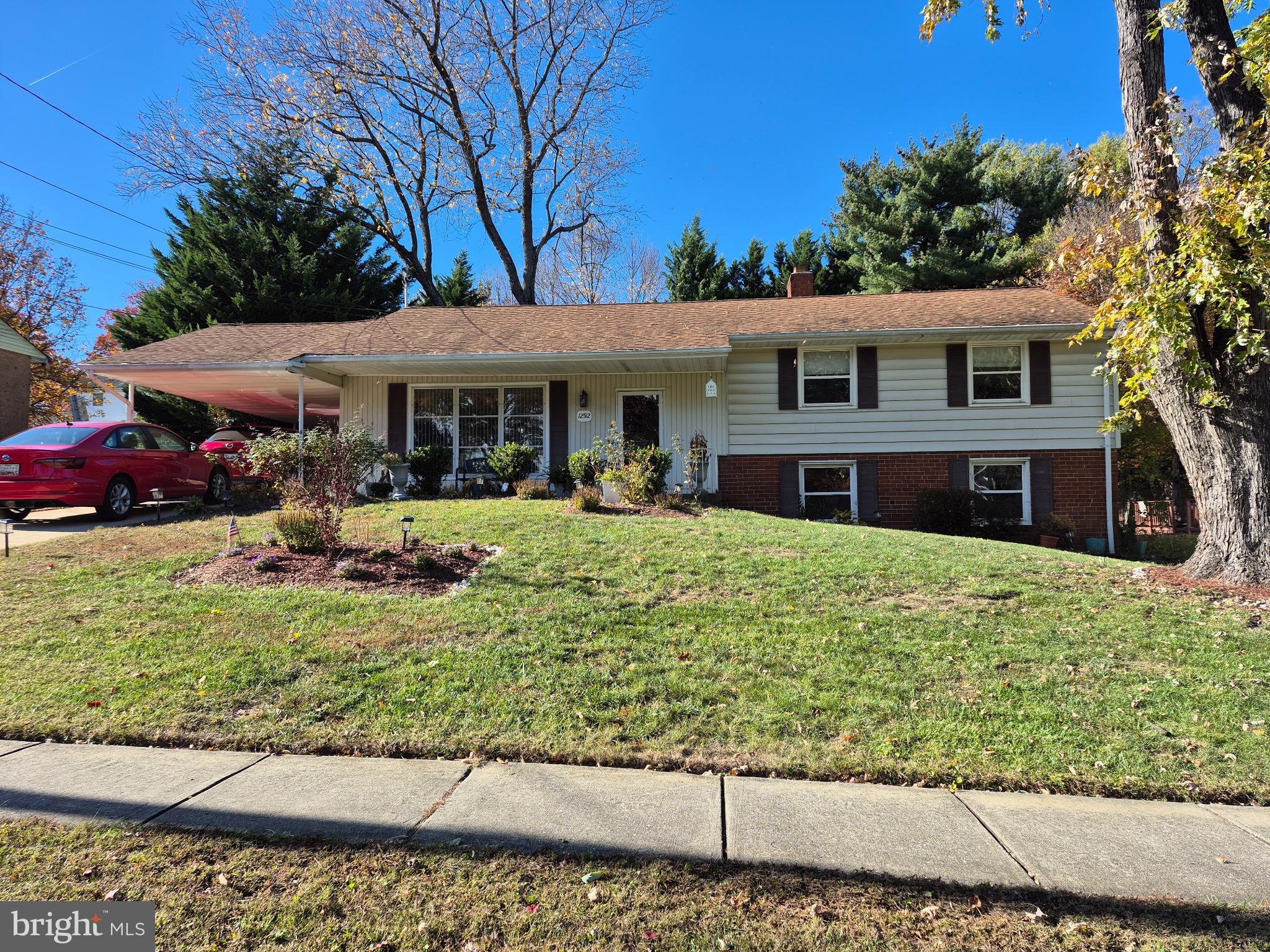 12512 Ofallon Street Silver Spring, MD 20904 - Photo 2 of 44 a front view of a house with a yard