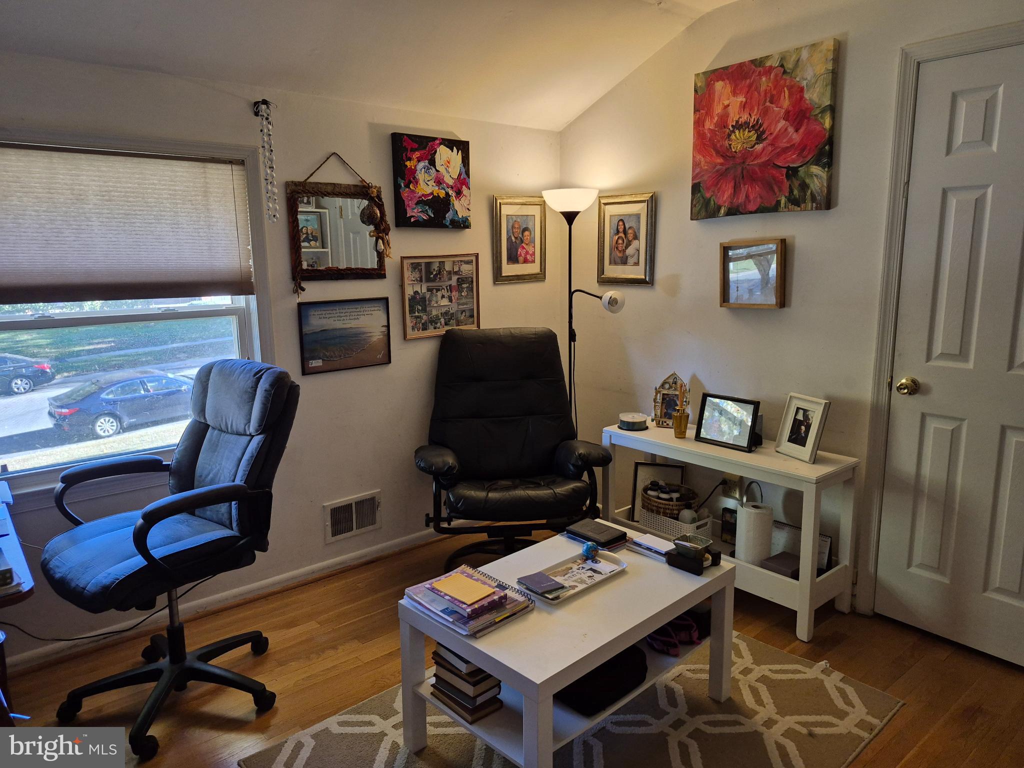 12512 Ofallon Street Silver Spring, MD 20904 - Photo 22 of 44 a workspace with furniture and wooden floor