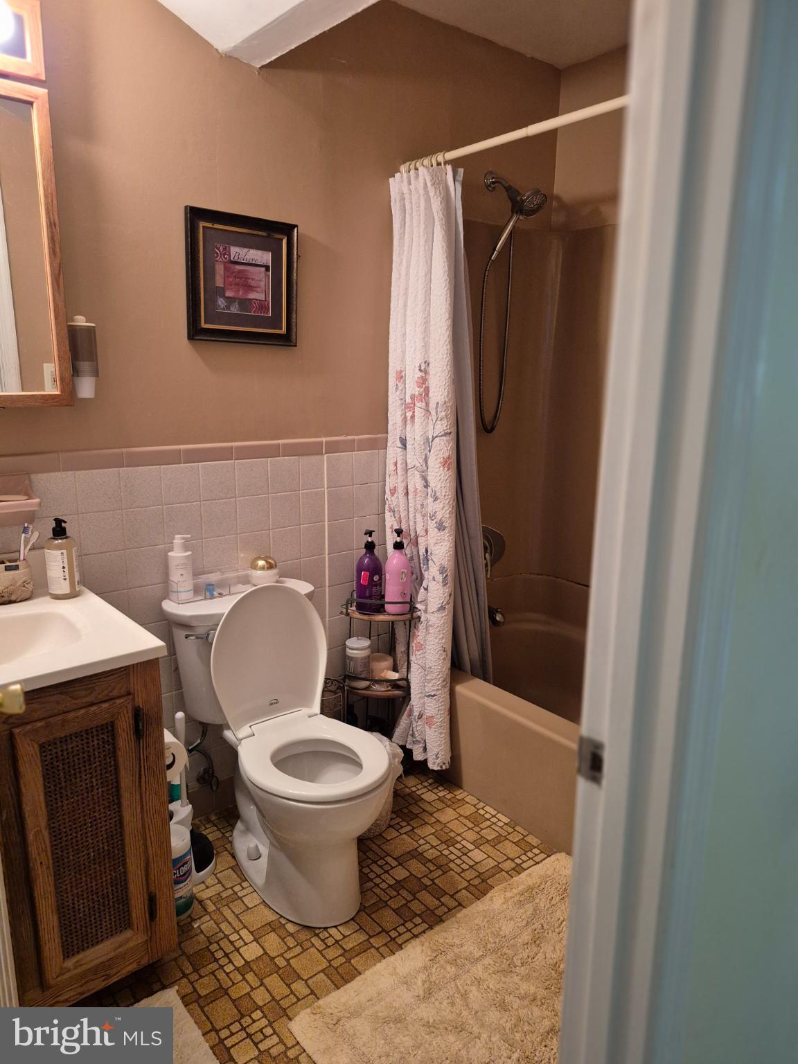 12512 Ofallon Street Silver Spring, MD 20904 - Photo 27 of 44 a bathroom with a toilet and a shower