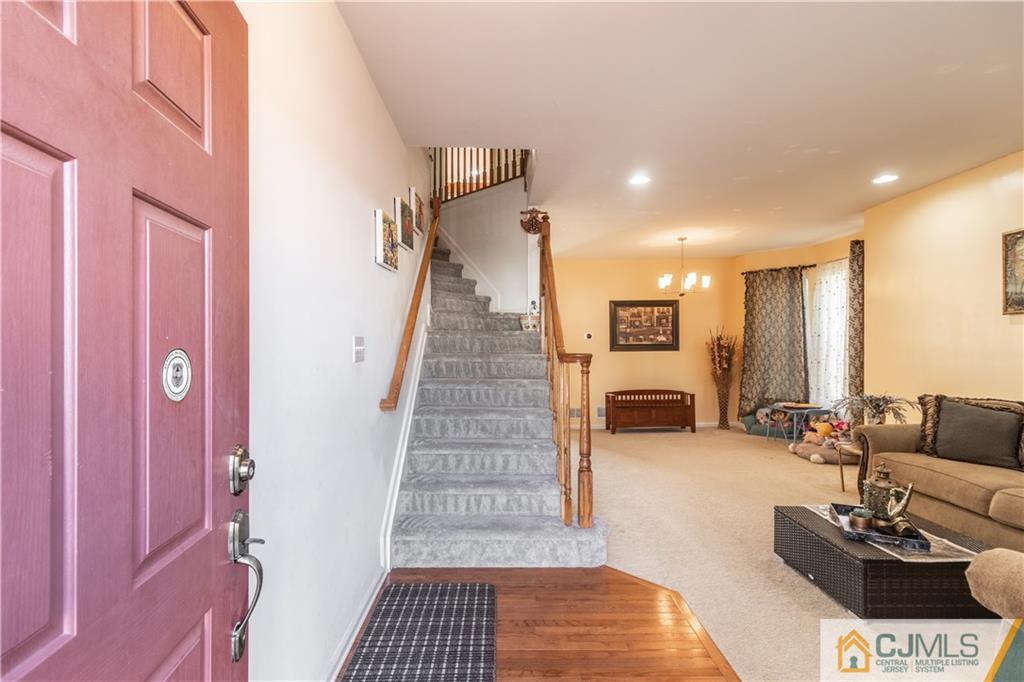 4 Seneca Lane Bordentown, NJ 08505 - Photo 4 of 29 a living room with furniture and a fireplace