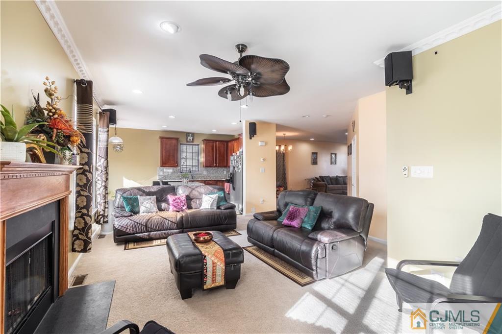 4 Seneca Lane Bordentown, NJ 08505 - Photo 7 of 29 a living room with furniture and a fireplace