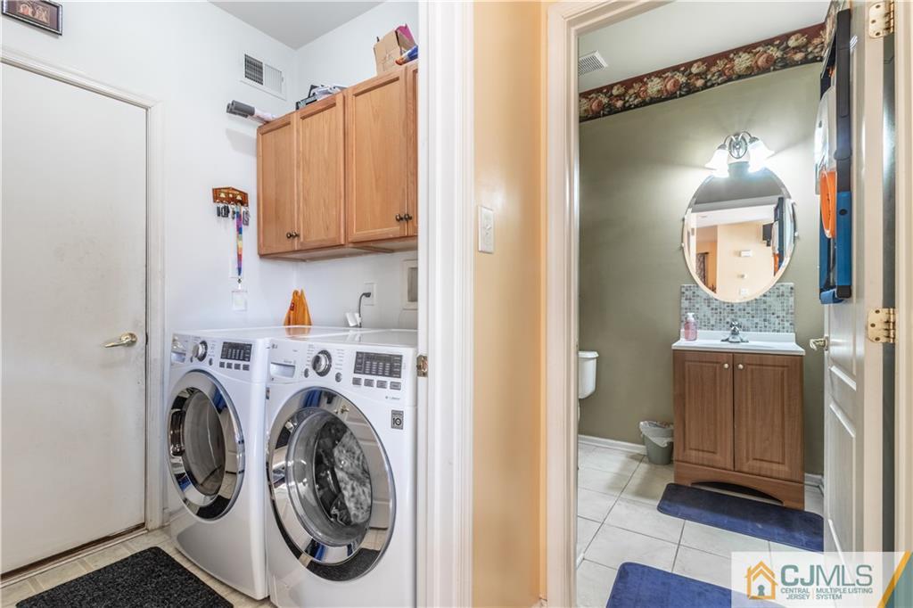 4 Seneca Lane Bordentown, NJ 08505 - Photo 10 of 29 a view of a hallway with washer and dryer