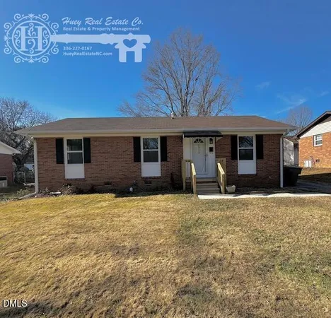 a front view of a house with yard