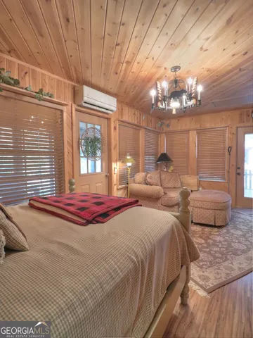 a view of a living room and wooden floor