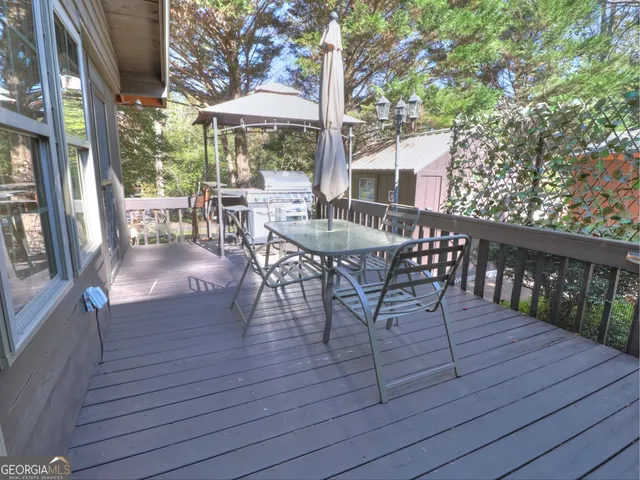 a house with trees in the background