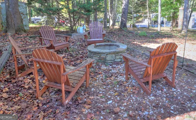 a view of a livingroom with furniture window and wooden floor