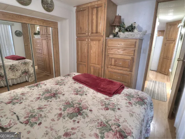 a view of a backyard with sitting area