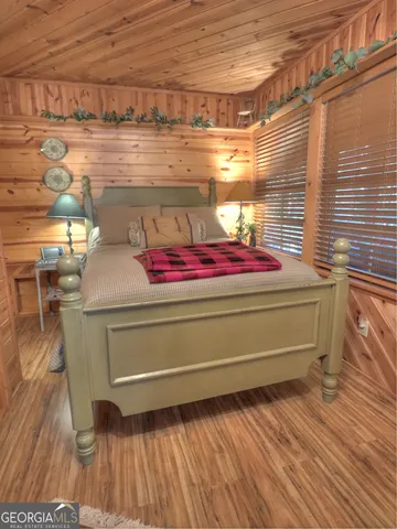 a yoga studio with wooden floor