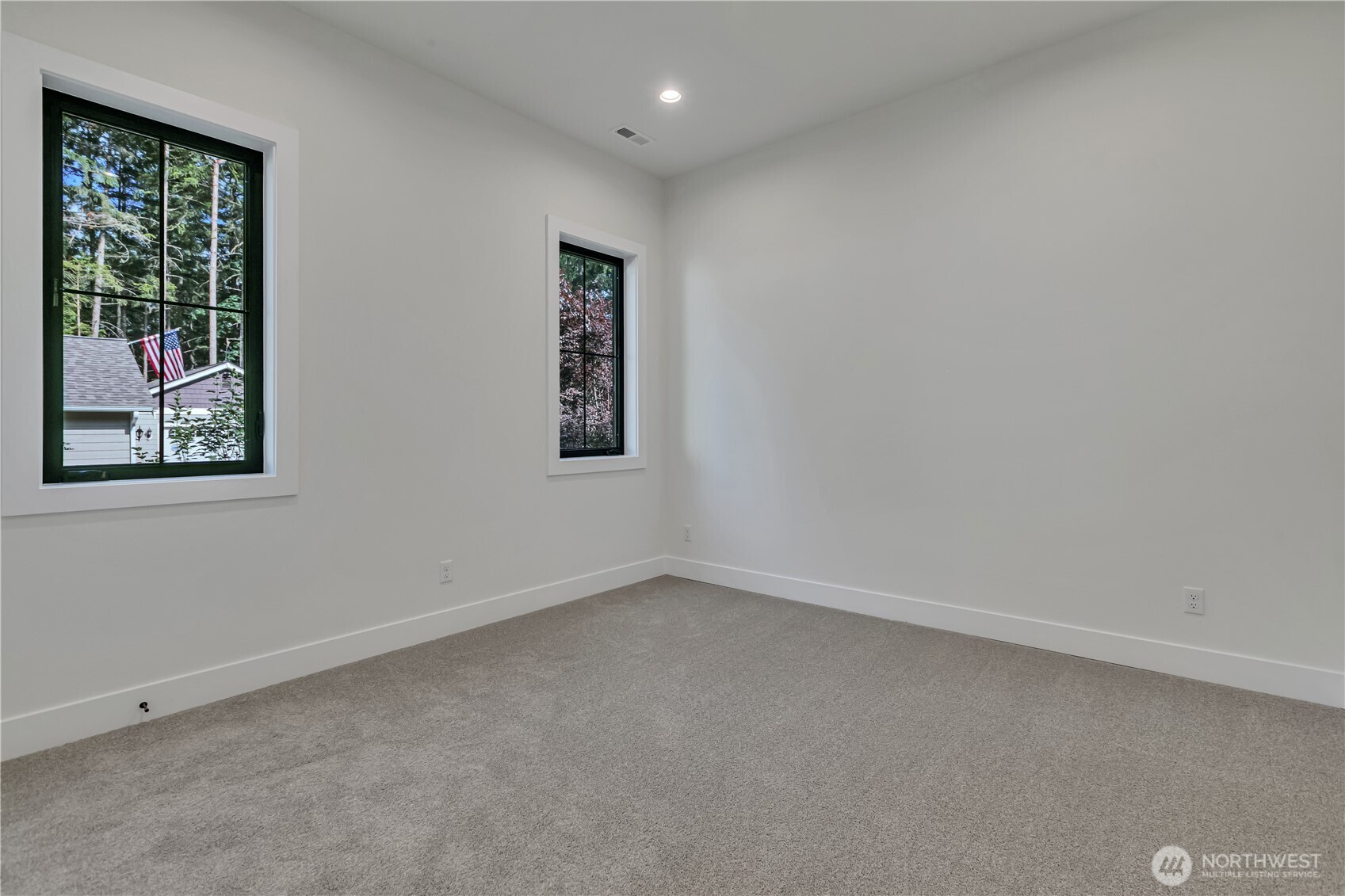 6709 254th Street East Graham, WA 98338 - Photo 29 of 40 an empty room with windows
