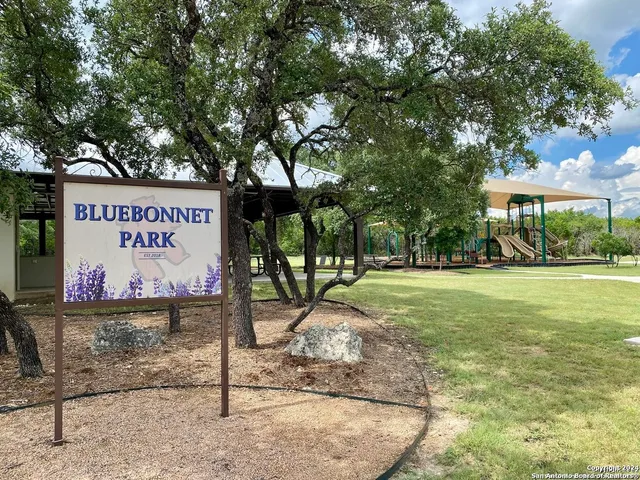 a sign on the side of the road