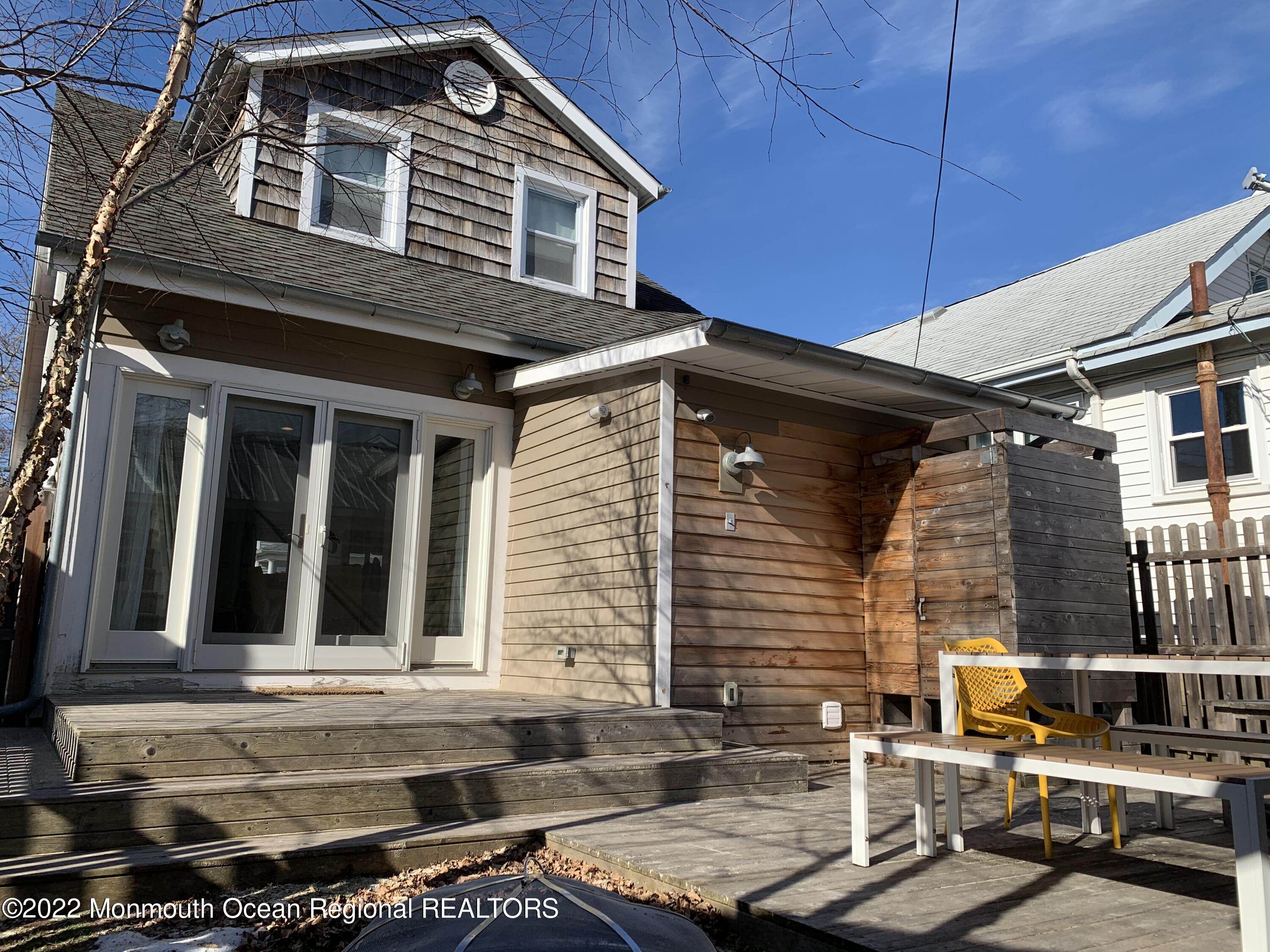 1836 Parkway Belmar, NJ 07719 - Photo 20 of 32 a front view of a house with a garden