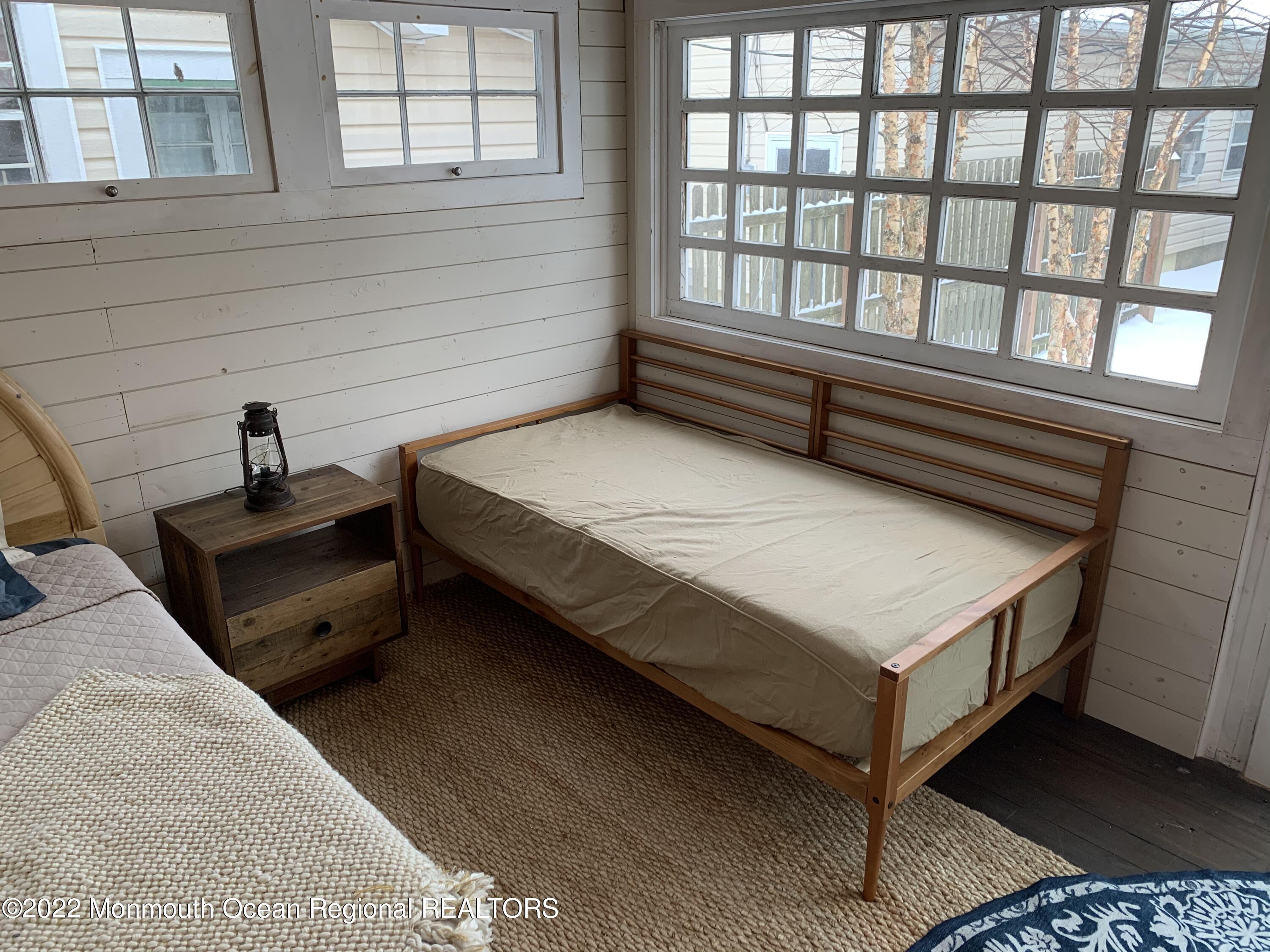 1836 Parkway Belmar, NJ 07719 - Photo 29 of 32 a spacious bedroom with a bed and a window