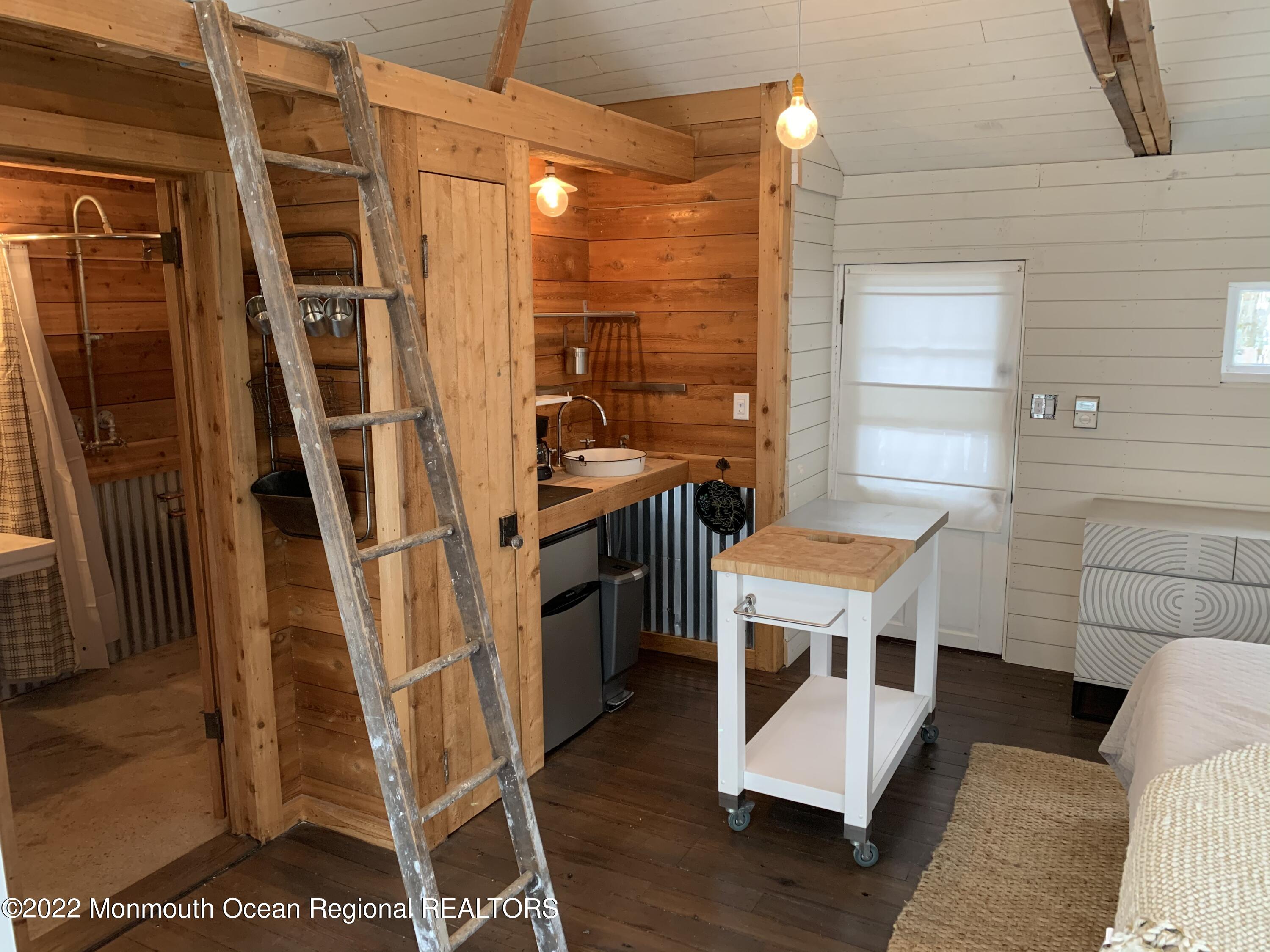 1836 Parkway Belmar, NJ 07719 - Photo 30 of 32 a view of a balcony with furniture and wooden floor