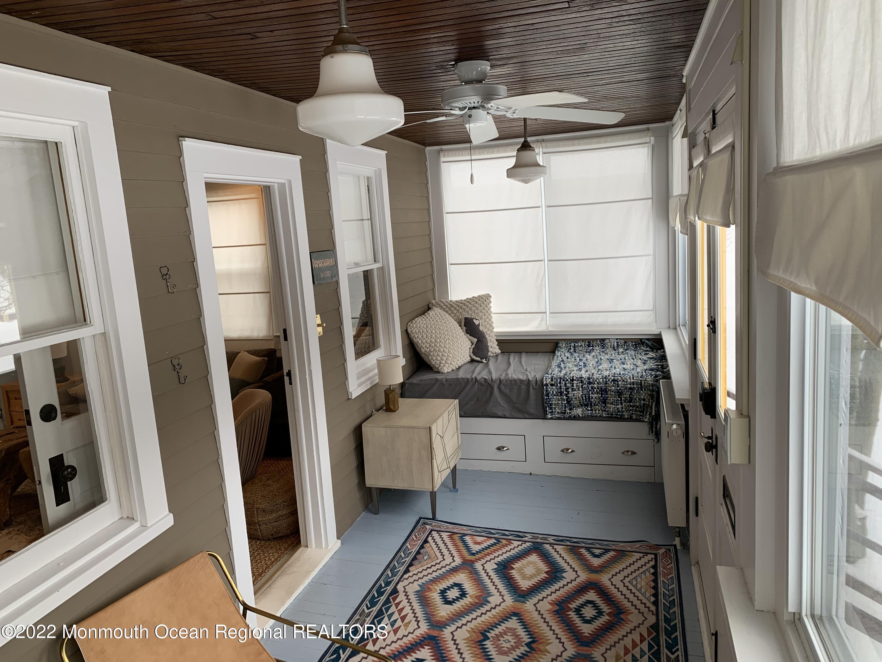 1836 Parkway Lake Como, NJ 07719 - Photo 3 of 32 a bedroom with furniture and a window