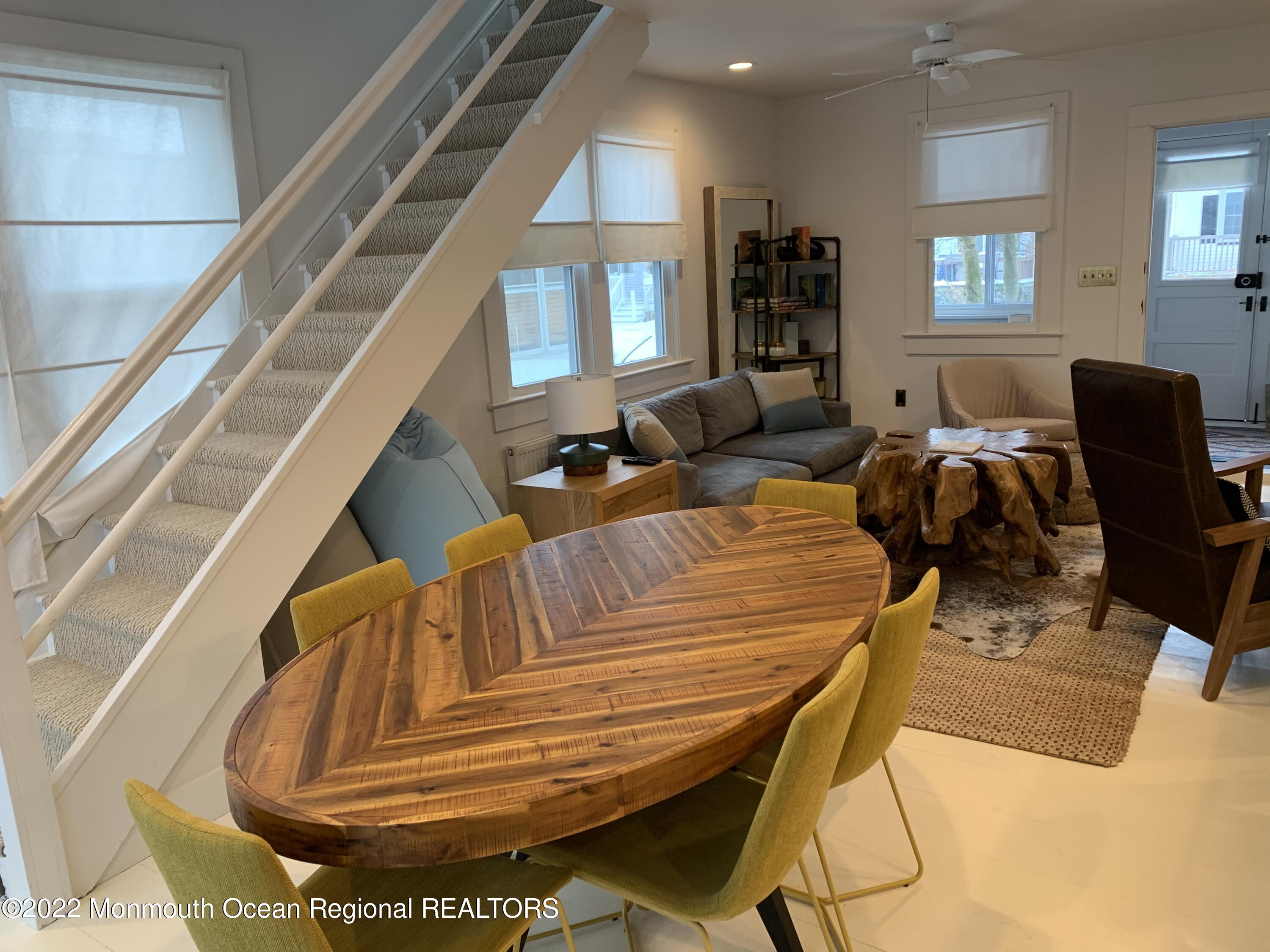 1836 Parkway Belmar, NJ 07719 - Photo 7 of 32 a living room with furniture and a fireplace