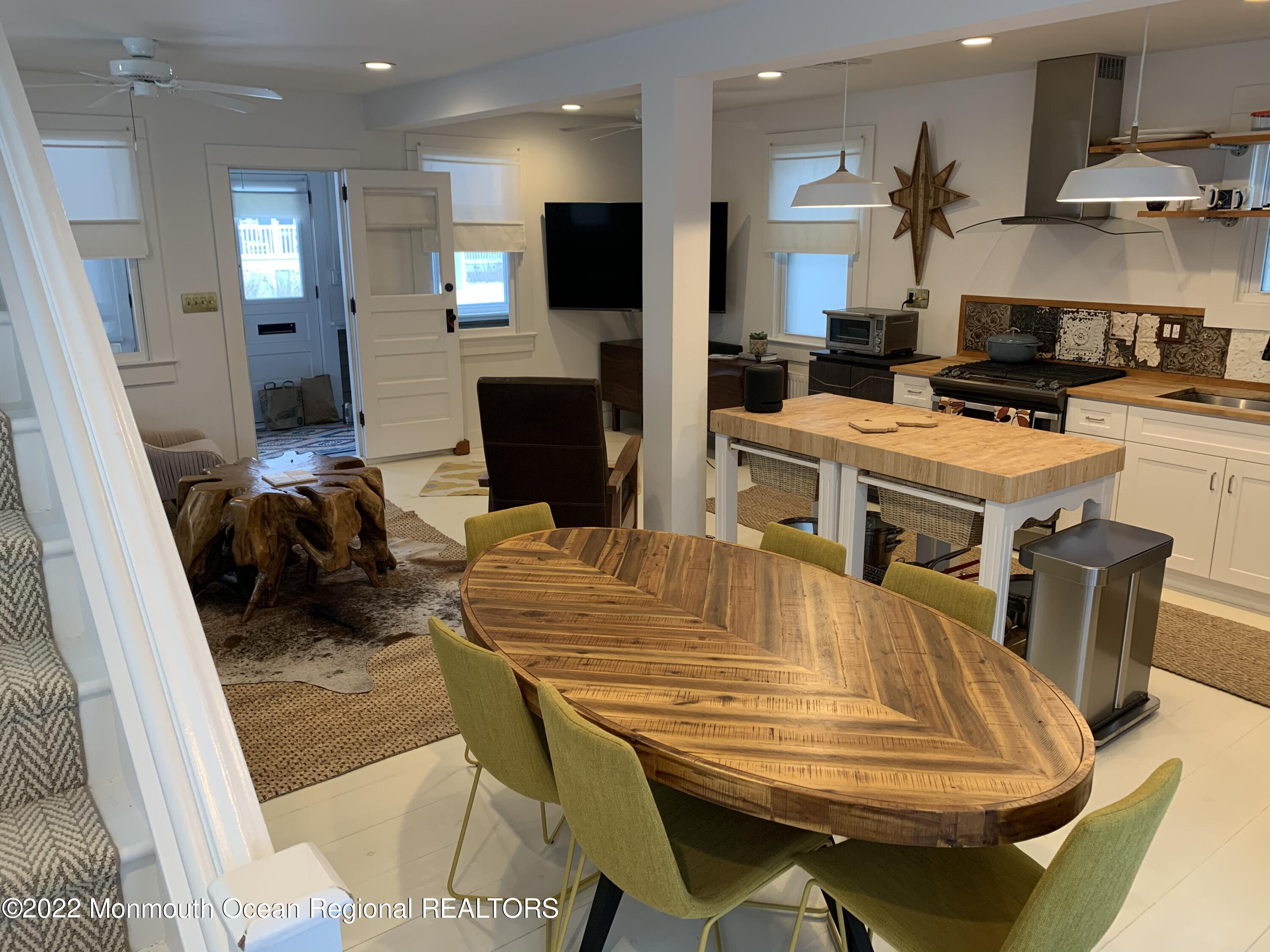 1836 Parkway Belmar, NJ 07719 - Photo 9 of 32 a living room with furniture and a fireplace