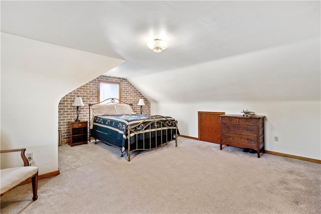 2490 Home Street Indiana, PA 15701 - Photo 13 of 22 a bedroom with furniture and a chandelier