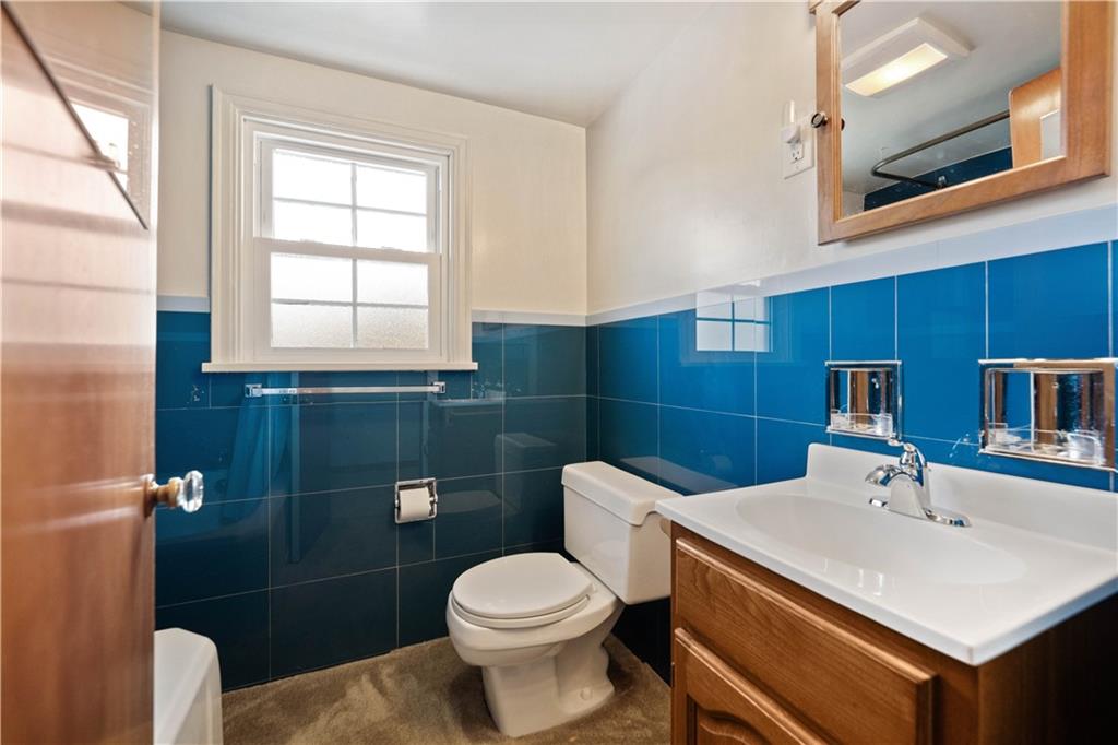 2490 Home Street Indiana, PA 15701 - Photo 18 of 22 a bathroom with a sink a toilet and a mirror